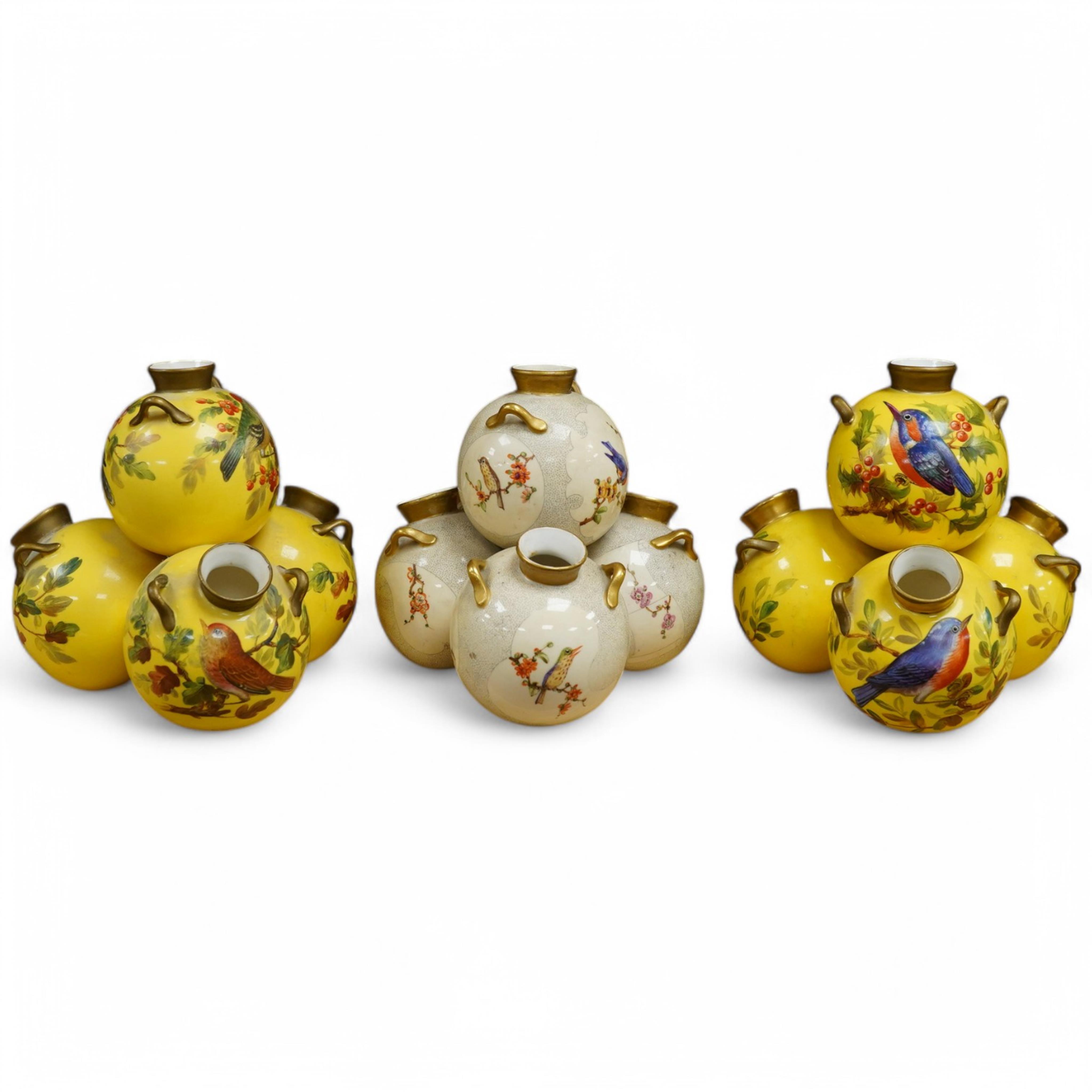 Three Royal Worcester 'pyramid' vases, painted with birds, 14cm high. Condition - fair/good